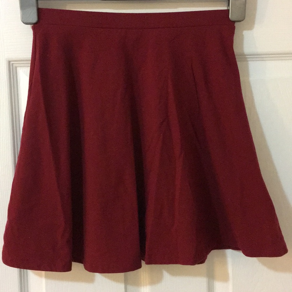 Burgundy red skater skirt.